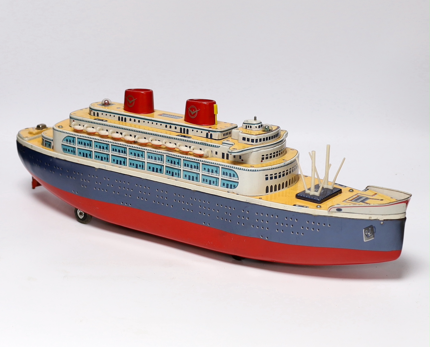 A boxed 1960s Modern Toys, Japan tinplate Queen of the Sea battery operated ocean liner, 54cm long